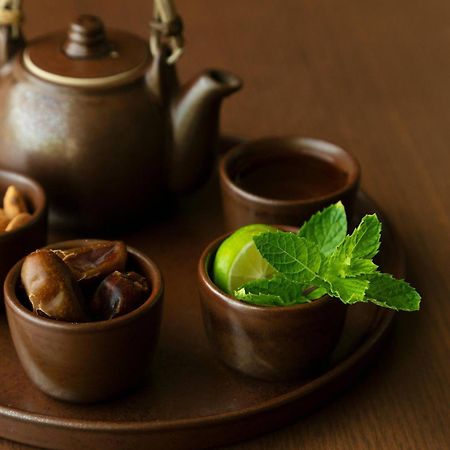Al Bustan Palace, A Ritz-Carlton Hotel Mascate Exterior foto A Japanese tea set